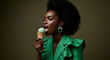 © Alexandra - Portrait of a dark-skinned model with stunning features, enjoying an ice cream, showcasing her natural beauty and confident expression in a stylish and elegant style