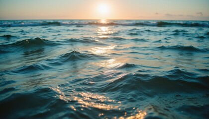 the sun reflects off the gently rolling waves, casting a dazzling array of light across the water
