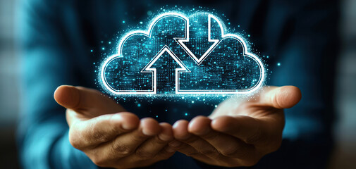Fototapete - businessman holds glowing cloud symbol representing cloud computing, emphasizing data transfer and online storage. This captures essence of modern technology and innovation