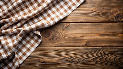 Poster - Rustic Brown and White Checkered Tablecloth Draped on a Weathered Wooden Surface, Providing a Charming and Versatile Background for Culinary or Rustic Themed Projects