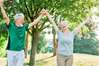 © Lumos sp - senior fitness woman man active sport exercise together running jogging hand celebrate celebration happy raised arm success victory team achievement teamwork winner up winning freedom healthy fit