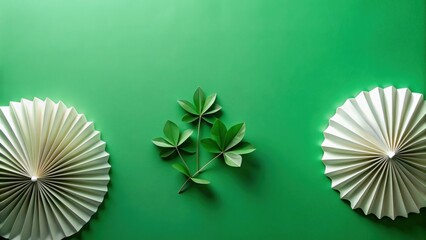 Aufkleber - Symmetrical Arrangement of Paper Fans and Green Foliage on a Vibrant Green Background