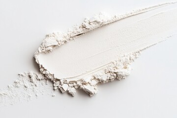 Leinwandbilder - White powder smeared across a flat surface showcasing texture and form during a creative process