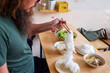 © Studio KME/Stocksy - Lifting a Long Strand of Rice Noodles