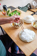 © Studio KME/Stocksy - Picking Up Rice Noodles with Chopsticks