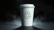 © Rika - Paper coffee cup with recycle symbol surrounded by smoke