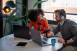 © VICTOR TORRES/Stocksy - Creative teamwork during modern podcast recording session