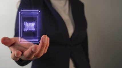 Businesswoman's hand holding a virtual icon of a phone with bar codes