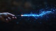 © Black - Hand holding a wand, casting a blue glowing magic spell with particles against a dark background.