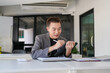 © Charlie's - Business man working on tablet presses on screen digital tablet Online Digital marketing  technology