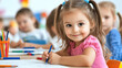 © Irina B - Adorable preschool girls engaged in creative drawing activity at classroom table with colored pencils