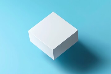 Fototapete - Clean white box on a light blue surface casting a soft shadow