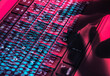 © Westend61 - Hands typing on a laptop keyboard with digital overlay representing cybersecurity and cyber crime