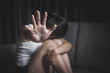 © Tinnakorn - Sad woman raised her hand for stop domestic violence. International Day for the Elimination of Violence against Women. violence against women.