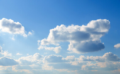 Wall Mural - beautiful blue sky with soft white clouds for abstract background