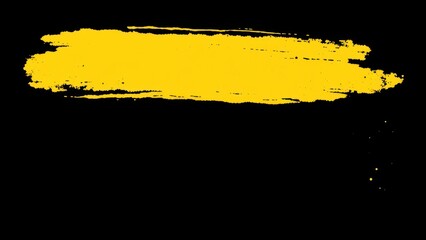 a close up of a yellow brush stroke on a black background,