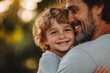© Vision Quest - Father, bonding kiss and boy child hug happy in nature with quality time together outdoor. Happiness, laughing and family love of a dad and kid in a park enjoying nature hugging with care and a