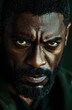 © Love is a ray of lig - Intense portrait of a determined African man with green eyes