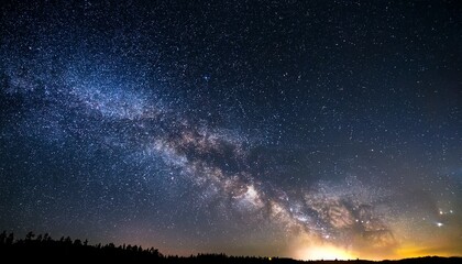 Wall Mural - milky way galaxy with stars and space dust in the universe long exposure photograph with grain