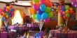 © kaitanan - Festive birthday decorations with vibrant balloon arrangements