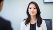 © ABD Miah - Confident Businesswoman in Meeting, Young professional woman in a business meeting.