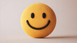 © dewi - Textured Yellow Smiley Face Emoticon with Smiling Expression in a Soft Lit Background and Minimalist Art Design and Positive Symbolism