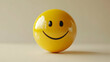 © dewi - Yellow Smiley Face with Glossy Surface Showing Happiness and Positive Emotions on Light Beige Background