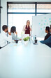 © peopleimages.com - Business people, coaching or whiteboard in presentation for profit growth, discussion or meeting. Talking, group or woman speaking of training ideas for teaching, research and revenue increase advice