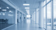 © StockWorld - Blurred Office Hallway: Modern Interior, Clean Workspace, Abstract Background, Light & Airy, Corporate Space, Blue Tones