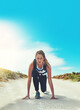 © Seisa/peopleimages.com - Fitness, portrait and start with woman outdoor on mountain trail for summer, exercise and health. Wellness, training and warm up with female athlete on coast for running, workout and morning cardio