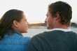 © Adene S/peopleimages.com - Happy couple, outdoor and bonding together with happiness, comfort and break in nature on weekend. People, love and affection for positive, care and support in summer for holiday as romantic partner