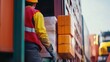 © Irybka - A construction worker loading supplies onto a delivery truck. Featuring efficiency and preparation