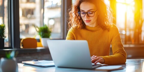 Aufkleber - A young woman, her laptop perched on her kitchen table, navigates the digital landscape as she manages her business from her home office, a testament to the flexibility o