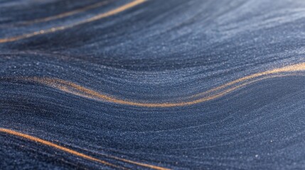Leinwandbilder - Close-up of swirling blue marble patterns features fine golden streaks, showcasing a smooth and dynamic texture ideal for backgrounds or artistic displays