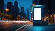© Md - Blank white digital billboard at night city bus stop. Empty space for advertisement on urban street. Cars pass by. Evening time. City street. Public transport. Modern design. Empty screen. Mockup for