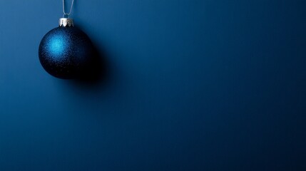 Aufkleber - Soft light reflections elevate the elegance of the deep blue background, showcasing a shimmering Christmas ornament and a single snowflake in this festive scene