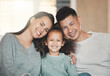 © Kirsten Davis/peopleimages.com - Happy, portrait and kid with parents on sofa in home for bonding, security and family time. Smile, relax and girl child with mother and father in living room for care, love or connection at house.
