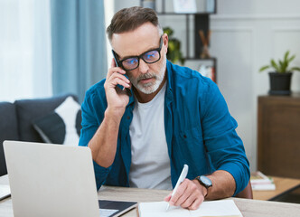 Aufkleber - Man, phonecall and home office writing in notebook, mature and business person or taking notes with virtual contact. Schedule appointment, online and conversation with laptop, communication and talk