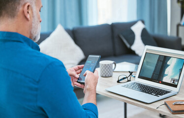 Leinwandbilder - Businessman, home and relax with laptop or smartphone, mobile app and crypto portfolio for digital assets. Male person, video call and online for cryptocurrency exchange and financial technology.