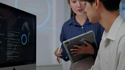 software developer talk strategy plan to executive write prompt AI bot IT app program data analytics in tech startup office.Projected visuals and glowing code on screen.AI chatbot technology concept