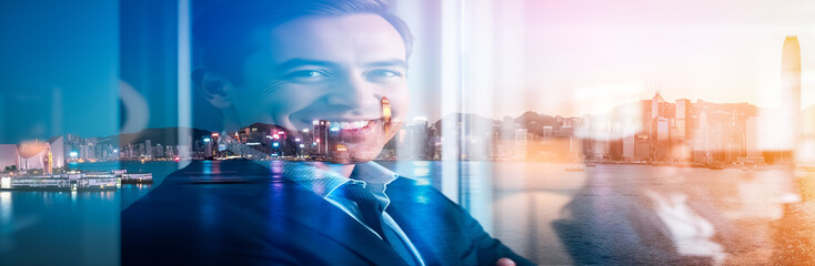Poster - Smiling businessman portrait using double exposure technique, overlaying Hong Kong's bright city lights and harbor view.