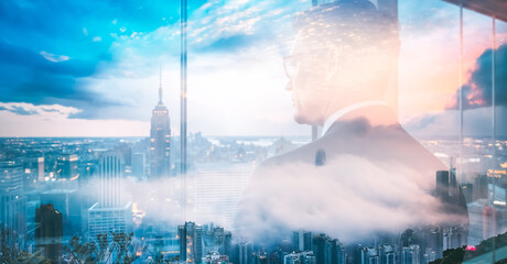 Poster - A double exposure blends a man gazing out over the Hong Kong cityscape at dusk. Clouds and city buildings merge in a scenic view.