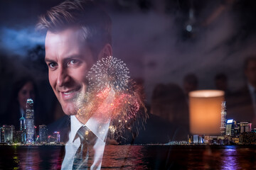Aufkleber - A smiling man in a suit is shown in a double exposure image with fireworks and the cityscape of Hong Kong at night, creating a festive and celebratory atmosphere.