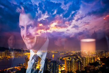 Aufkleber - Smiling man portrait double exposure with Hong Kong night cityscape under a colorful cloudy sky. Urban scene with city lights and harbor view.