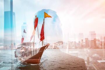 Aufkleber - A double exposure image blends a junk boat sailing in Hong Kong harbor with city skyscrapers. The vibrant skyline merges with the traditional vessel, creating a unique urban seascape.
