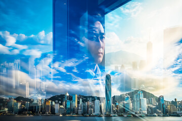 Poster - Double exposure of a thoughtful person overlooking the cityscape of Hong Kong against a bright, cloudy sky. Urban reflection blends with contemplative mood.