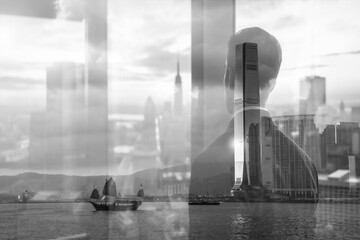 Poster - Monochrome double exposure art of Hong Kong. A silhouette gazes over the city and harbor, blending with buildings and a traditional junk boat in a layered view.