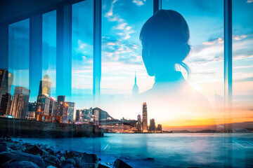 Poster - A contemplative silhouette overlooks Hong Kong's vibrant cityscape at sunset, achieved through a double exposure technique, blending urban life with serene reflection by the water.