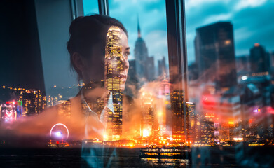 Poster - Double exposure blends a woman's silhouette with Hong Kong's bright nighttime cityscape, creating a dreamy urban scene. City lights blur.