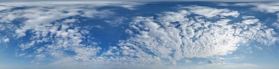 Wall Mural - blue sky hdri 360 panorama with clouds and sun before sunset with zenith for use in 3d graphics as s